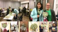 Participants and their finished bouquets at the DIY Bouquet Workshop